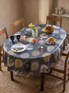 Toile cirée molletonné Feuillu Or – feuillages dorés et beiges sur fond gris foncé, OEKO-TEX®, largeur 140 cm
