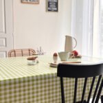 Toile cirée vichy vert pomme – carreaux blancs et verts, largeur 140 cm