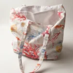 Tote bag artisanal coton enduit Anémone – motif marin coraux et poissons aquarellés, doublure polyester effet lin, anses longues porté épaule