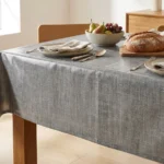 Toile cirée déco Uni Gris 180 cm – texture façon lin gris argenté, vendue au mètre ou sur mesure