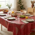 Toile cirée coton molletonné Rougeâtre 160 cm – grands arcs effilés beige crème sur fond rouge brique profond