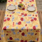 Nappe polyester coquelicot Poppies coloris jaune – motif floral graphique en semis