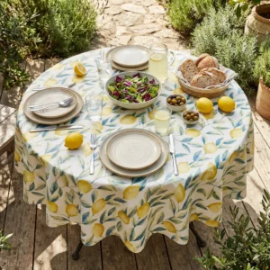 Toile cirée ronde Citron 160 cm – motif citrons jaune soleil et feuillages bleu-vert aquarelle sur fond blanc crème