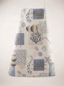 Tablier adulte toile cirée Croisic motif marin coquillages et étoiles de mer sur fond blanc