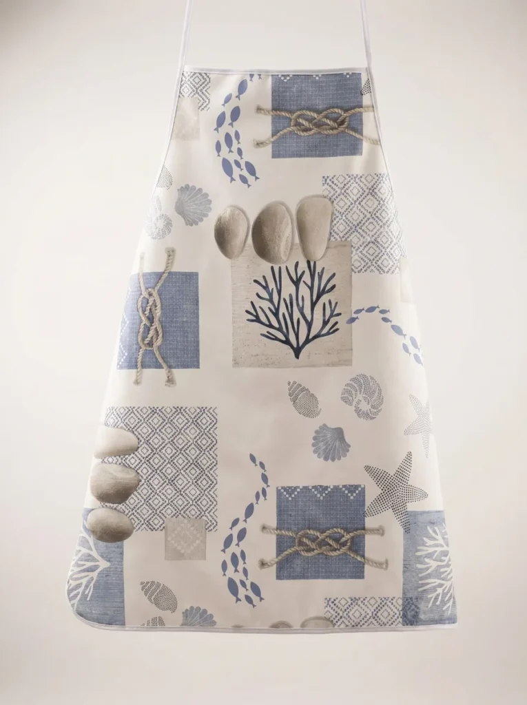 Tablier adulte toile cirée Croisic motif marin coquillages et étoiles de mer sur fond blanc