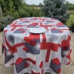 Nappe polyester sur mesure Estelle rouge ovale en terrasse – motif cœurs rouge et gris