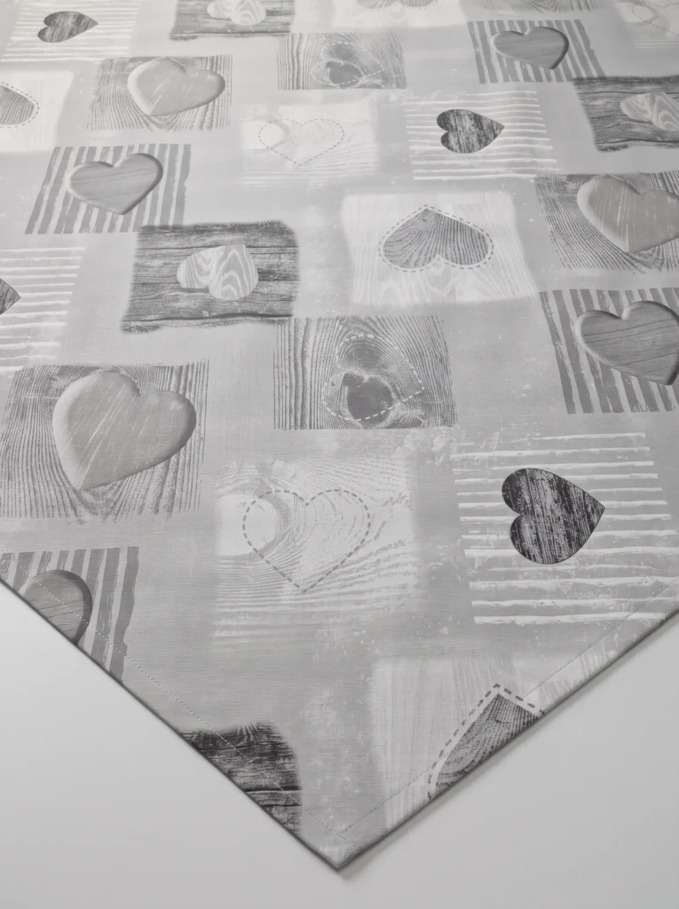 Toile cirée molletonné Tendresse Gris – motif cœurs graphiques en camaïeu de gris et blanc, OEKO-TEX®, largeur 140 cm