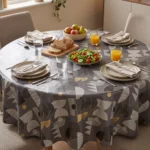 Toile cirée molletonné Ribe Or – motif géométrique graphique en gris ardoise et touches dorées, OEKO-TEX®, largeur 140 cm