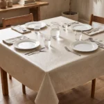 Toile cirée molletonné Chateaubry – motif damassé floral en ivoire et beige, OEKO-TEX®, largeur 140 cm